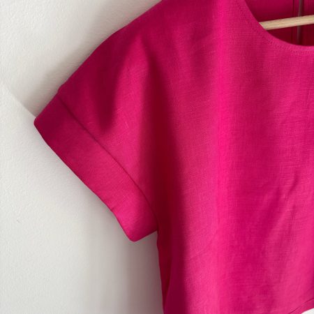 La Blusa fucsia over